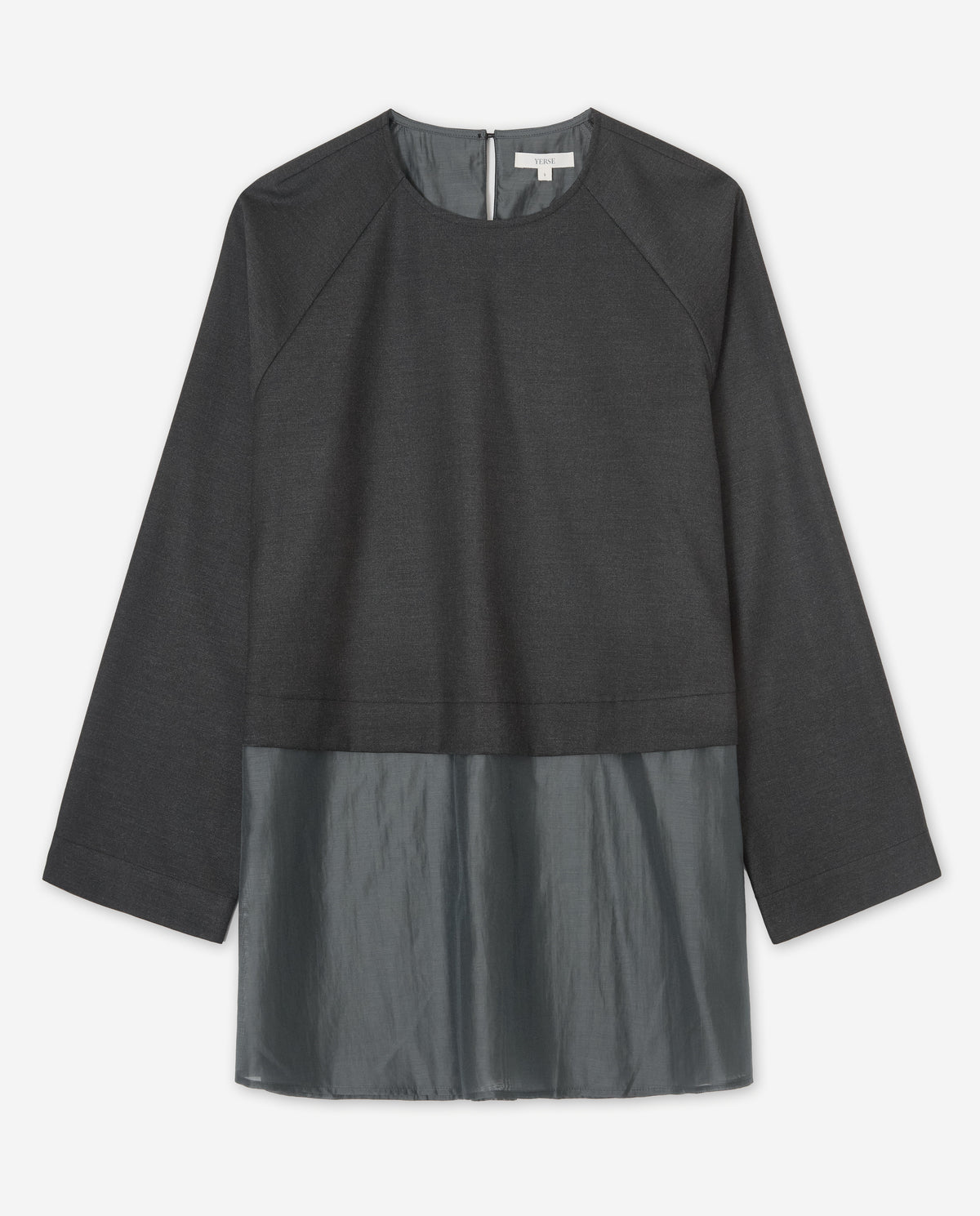 A dark gray long-sleeve top with a solid upper body and a sheer, semi-transparent lower skirt panel, displayed flat against a light gray background.