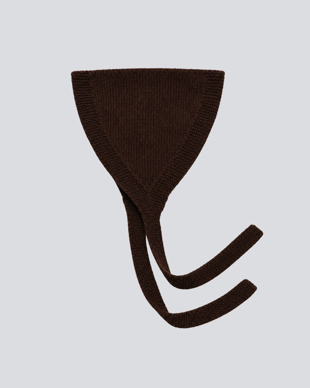 A dark brown ribbed knit headband with long ties, shown flat against a light gray background.